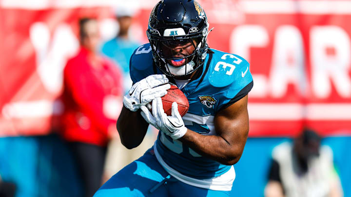Jacksonville Jaguars running back Bhayshul Tuten (33) returns a kick off return during the first quarter in an NFL football AFC Wild Card playoff matchup, Sunday, Jan. 11, 2026, in Jacksonville, Fla. Bills lead 10-7 at the half over the Jaguars. 