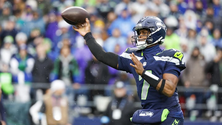 Dec 22, 2024; Seattle, Washington, USA; Seattle Seahawks quarterback Geno Smith (7) passes against the Minnesota Vikings during the second quarter at Lumen Field. Mandatory Credit: Joe Nicholson-Imagn Images