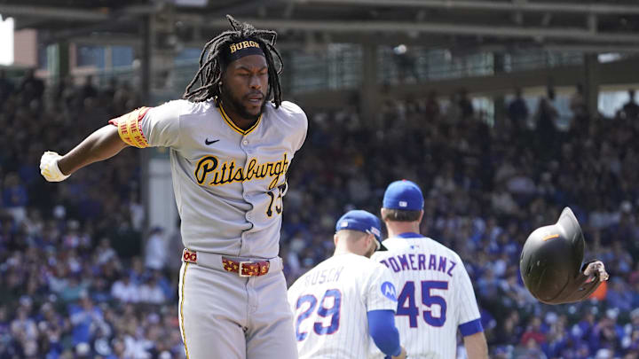 Jun 14, 2025; Chicago, Illinois, USA; Pittsburgh Pirates outfielder Oneil Cruz (15) throws his helmet after making the final out against the Chicago Cubs during the ninth inning at Wrigley Field. Mandatory Credit: David Banks-Imagn Images