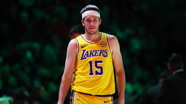 Dec 23, 2025; Phoenix, Arizona, USA; Los Angeles Lakers guard Austin Reaves (15) against the Phoenix Suns at Mortgage Matchup Center. Mandatory Credit: Mark J. Rebilas-Imagn Images