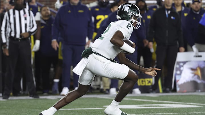 Oct 26, 2024; Ann Arbor, Michigan, USA;  Michigan State Spartans quarterback Aidan Chiles (2) rushes in the first half against the Michigan Wolverines at Michigan Stadium. Mandatory Credit: Rick Osentoski-Imagn Images