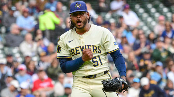 Sep 4, 2025; Milwaukee, Wisconsin, USA;  Milwaukee Brewers starting pitcher Freddy Peralta (51) reacts after striking out Philadelphia Phillies third baseman Alec Bohm (not pictured) with the bases loaded in the fourth inning at American Family Field. Mandatory Credit: Benny Sieu-Imagn Images