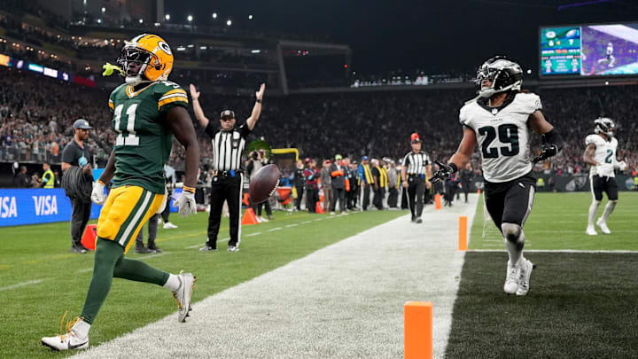 Green Bay Packers wide receiver Jayden Reed (11) scores a touchdown against the Philadelphia Eagles in Brazil. Green Bay Packers wide receiver Jayden Reed (11) scores a touchdown against the Philadelphia Eagles in Brazil.