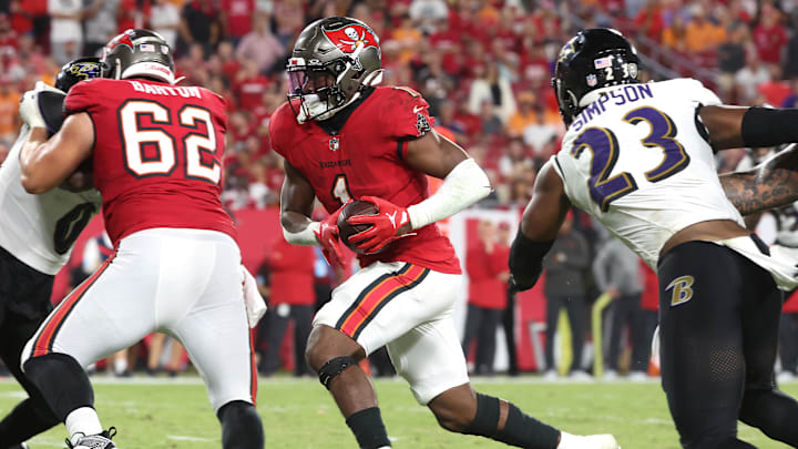 Oct 21, 2024; Tampa, Florida, USA; Tampa Bay Buccaneers running back Rachaad White (1) runs the ball for a touchdown against the Baltimore Ravens during the second half at Raymond James Stadium. Mandatory Credit: Kim Klement Neitzel-Imagn Images