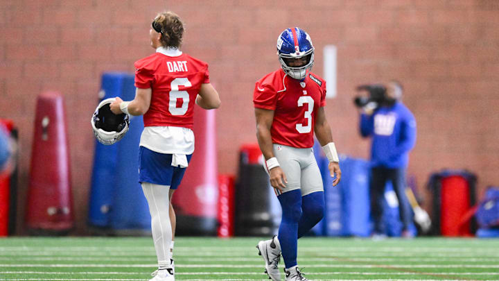 Jun 17, 2025; East Rutherford, NJ, USA; New York Giants quarterback Jaxson Dart (6) and quarterback Russell Wilson (3) interact during minicamp at Quest Diagnostics Training Center. Mandatory Credit: John Jones-Imagn Images