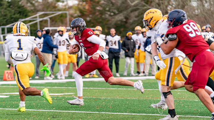 Quarterback Peter Bourque runs with the ball.