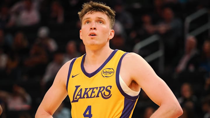 Jul 6, 2024; San Francisco, CA, USA; Los Angeles Lakers guard Dalton Knecht (4) between plays against the Sacramento Kings during the fourth quarter at Chase Center. Mandatory Credit: Kelley L Cox-USA TODAY Sports
