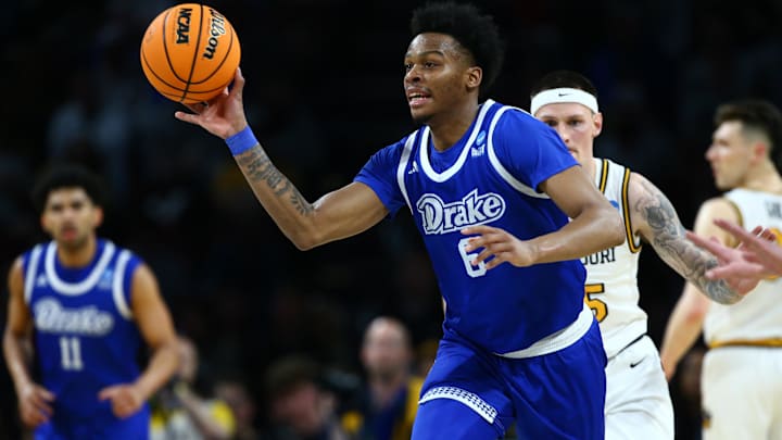 Mar 20, 2025; Wichita, KS, USA; Drake Bulldogs guard Tavion Banks (6) passes in the second half of a first round men’s NCAA Tournament game against the Missouri Tigers at Intrust Bank Arena. Mandatory Credit: Nick Tre. Smith-Imagn Images