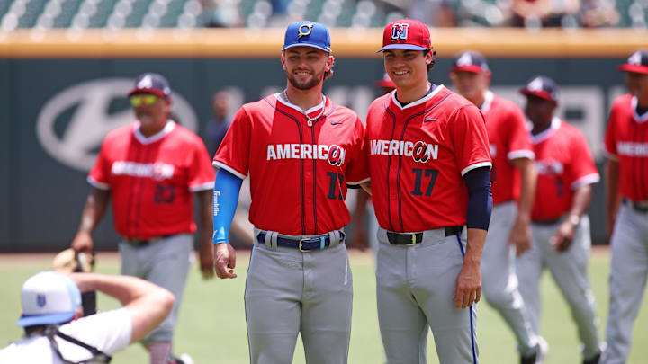 Jul 12, 2025; Atlanta, GA, USA;  American League catcher Carter Jensen (17) of the Kansas City Royals  and American League pitcher Frank Mozzicato of the Northwest Arkansas Naturals pose for a photo before the game at Truist Park. Mandatory Credit: Brett Davis-Imagn Images