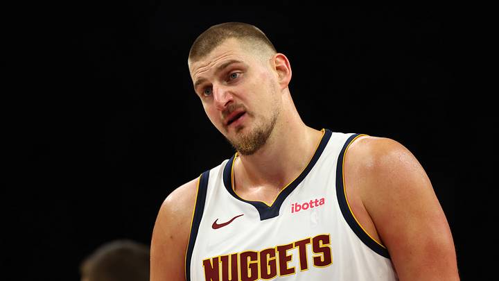 Nov 29, 2025; Phoenix, Arizona, USA; Denver Nuggets center Nikola Jokic (15) against the Phoenix Suns at the Mortgage Matchup Center. Mandatory Credit: Mark J. Rebilas-Imagn Images