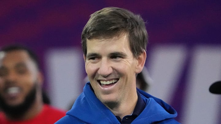 Feb 2, 2023; Henderson, NV, USA; Eli Manning reacts during the Pro Bowl Skills competition at the Intermountain Healthcare Performance Facility. Mandatory Credit: Kirby Lee-Imagn Images
