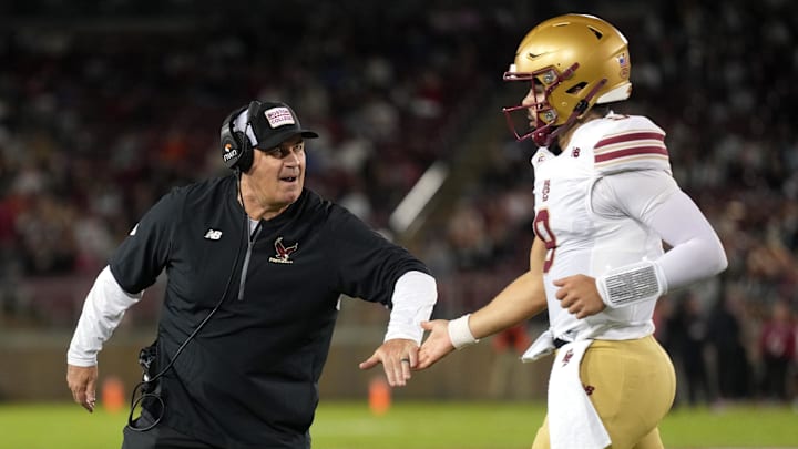 Sep 13, 2025; Stanford, California, USA; Boston College Eagles head coach Bill O'Brien (left) congratulates quarterback Dylan Lonergan (right) during the second quarter against the Stanford Cardinal at Stanford Stadium. Mandatory Credit: Darren Yamashita-Imagn Images Sep 13, 2025; Stanford, California, USA; Boston College Eagles head coach Bill O'Brien (left) congratulates quarterback Dylan Lonergan (right) during the second quarter against the Stanford Cardinal at Stanford Stadium. Mandatory Credit: Darren Yamashita-Imagn Images