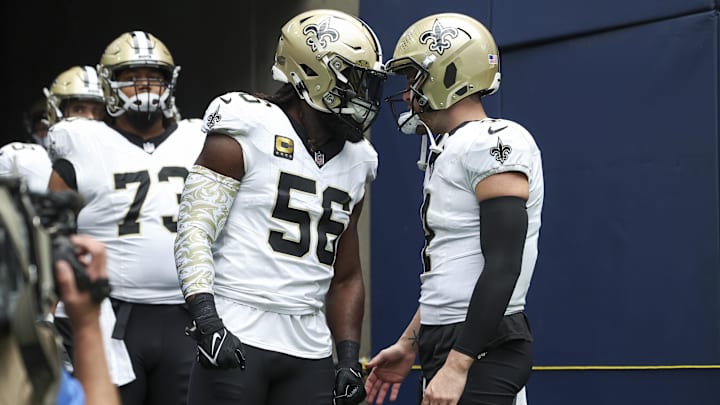 Oct 15, 2023; Houston, Texas, USA; New Orleans Saints linebacker Demario Davis (56) and quarterback Derek Carr (4) prepare to walk onto the field before the game against the Houston Texans at NRG Stadium. Mandatory Credit: Troy Taormina-Imagn Images Oct 15, 2023; Houston, Texas, USA; New Orleans Saints linebacker Demario Davis (56) and quarterback Derek Carr (4) prepare to walk onto the field before the game against the Houston Texans at NRG Stadium. Mandatory Credit: Troy Taormina-Imagn Images