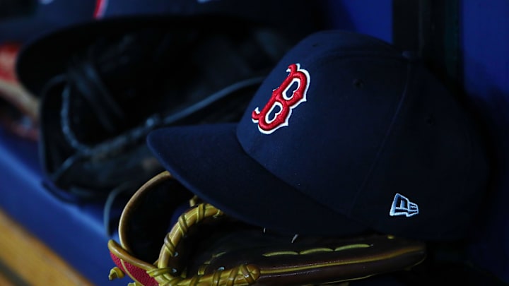 Jul 22, 2019; St. Petersburg, FL, USA; A detail view of Boston Red Sox hat and glove laying in the dugout at Tropicana Field. Mandatory Credit: Kim Klement-Imagn Images Jul 22, 2019; St. Petersburg, FL, USA; A detail view of Boston Red Sox hat and glove laying in the dugout at Tropicana Field. Mandatory Credit: Kim Klement-Imagn Images