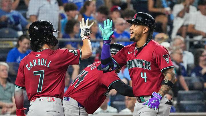 Jul 24, 2024; Kansas City, Missouri, USA; Arizona Diamondbacks second baseman Ketel Marte (4) celebrates with right fielder Corbin Carroll (7) after hitting a three-run home run against the Kansas City Royals in the ninth inning at Kauffman Stadium. Mandatory Credit: Denny Medley-USA TODAY Sports