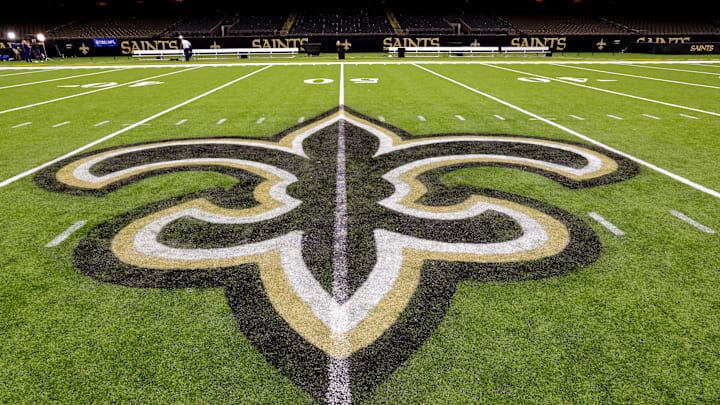 Oct 30, 2022; New Orleans, Louisiana, USA;  General view of the New Orleans Saints logo as the midfield logo fleur-de-lis after the game between the New Orleans Saints and the Las Vegas Raiders at Caesars Superdome. Mandatory Credit: Stephen Lew-Imagn Images