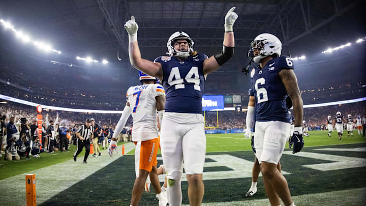 Dec 31, 2024; Glendale, AZ, USA; Penn State Nittany Lions tight end Tyler Warren (44) celebrates with wide receiver Harrison Wallace III (6) after scoring a touchdown against the Boise State Broncos in the Fiesta Bowl at State Farm Stadium. Dec 31, 2024; Glendale, AZ, USA; Penn State Nittany Lions tight end Tyler Warren (44) celebrates with wide receiver Harrison Wallace III (6) after scoring a touchdown against the Boise State Broncos in the Fiesta Bowl at State Farm Stadium.