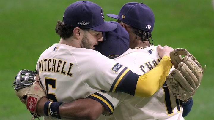 Milwaukee Brewers center fielder Garrett Mitchell (5), right fielder Luis Lara (18) and left fielder Jackson Chourio (11) hug after their National League Division Series game against the San Diego Padres Saturday, October 3, 2026 at American Family Field in Milwaukee, Wisconsin. Milwaukee Brewers center fielder Garrett Mitchell (5), right fielder Luis Lara (18) and left fielder Jackson Chourio (11) hug after their National League Division Series game against the San Diego Padres Saturday, October 3, 2026 at American Family Field in Milwaukee, Wisconsin.