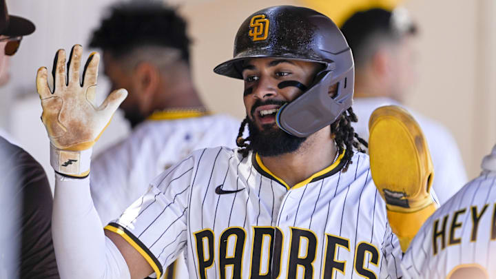 Apr 30, 2025; San Diego, California, USA; San Diego Padres right fielder Fernando Tatis Jr. (23) is congratulated after scoring during the fifth inning at Petco Park. Mandatory Credit: Denis Poroy-Imagn Images Apr 30, 2025; San Diego, California, USA; San Diego Padres right fielder Fernando Tatis Jr. (23) is congratulated after scoring during the fifth inning at Petco Park. Mandatory Credit: Denis Poroy-Imagn Images