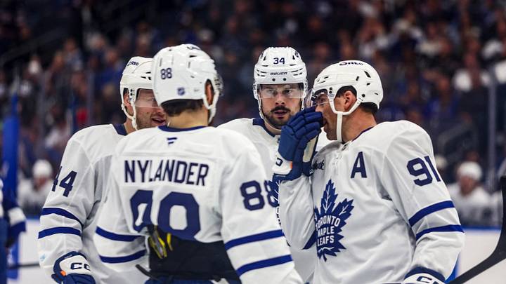 Feb 25, 2026; Tampa, Florida, USA; Toronto Maple Leafs forward Auston Matthews (34), defenseman Morgan Rielly (44), forward William Nylander (88), and forward John Tavares (91) huddle before a face-off against the Tampa Bay Lightning during the second period at Benchmark International Arena. Mandatory Credit: Morgan Tencza-Imagn Images Feb 25, 2026; Tampa, Florida, USA; Toronto Maple Leafs forward Auston Matthews (34), defenseman Morgan Rielly (44), forward William Nylander (88), and forward John Tavares (91) huddle before a face-off against the Tampa Bay Lightning during the second period at Benchmark International Arena. Mandatory Credit: Morgan Tencza-Imagn Images