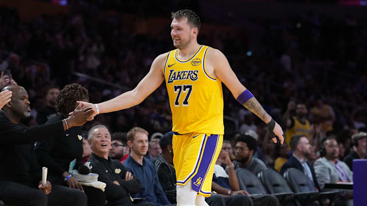 Oct 24, 2025; Los Angeles, California, USA; Los Angeles Lakers guard Luka Doncic (77) returns to the be3nch in the fourth quarteragainst the Minnesota Timberwolves at Crypto.com Arena. Mandatory Credit: Kirby Lee-Imagn Images Oct 24, 2025; Los Angeles, California, USA; Los Angeles Lakers guard Luka Doncic (77) returns to the be3nch in the fourth quarteragainst the Minnesota Timberwolves at Crypto.com Arena. Mandatory Credit: Kirby Lee-Imagn Images