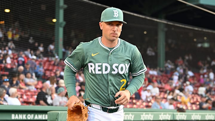 May 16, 2025; Boston, Massachusetts, USA; Boston Red Sox third baseman Alex Bregman (2) runs out of the dugout before the start of a game against the Atlanta Braves at Fenway Park. Mandatory Credit: Eric Canha-Imagn Images