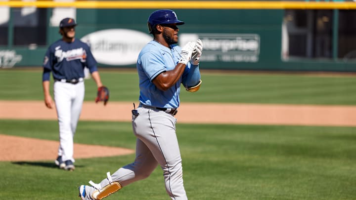 Mar 14, 2021; North Port, Florida, USA; Tampa Bay Rays left fielder Moises Gomez (93) reacts after hitting a home run against the Atlanta Braves in the eighth inning during spring training at CoolToday Park. Mandatory Credit: Nathan Ray Seebeck-Imagn Images