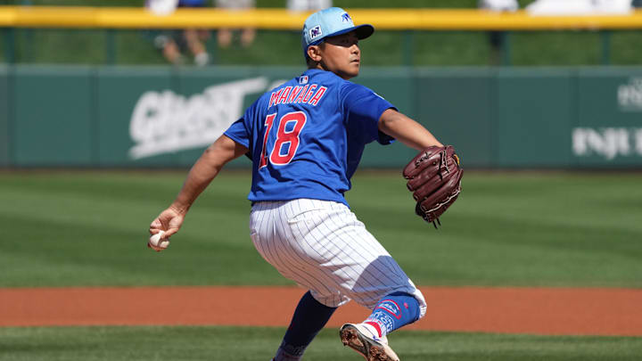 Mar 4, 2025; Mesa, Arizona, USA; Chicago Cubs pitcher Shota Imanaga (18) throws against the San Diego Padres in the first inning at Sloan Park.