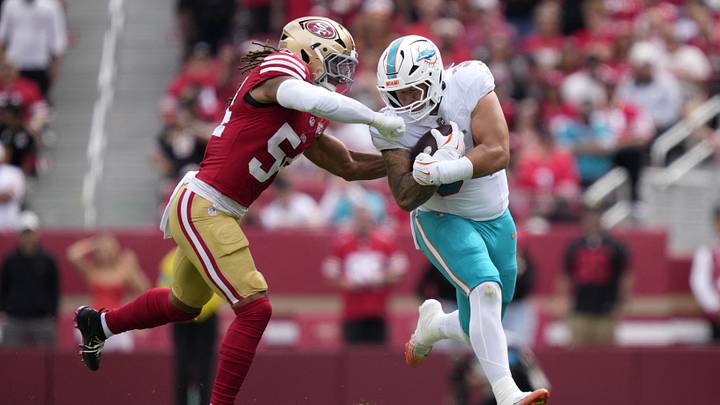 Miami Dolphins fullback DJ Herman (34) carries the ball against San Francisco 49ers linebacker Fred Warner (54) in the first half at Levi's Stadium. Miami Dolphins fullback DJ Herman (34) carries the ball against San Francisco 49ers linebacker Fred Warner (54) in the first half at Levi's Stadium.