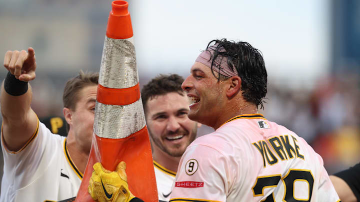 Apr 4, 2026; Pittsburgh, Pennsylvania, USA;  Pittsburgh Pirates designated hitter Nick Yorke (38) celebrates with a traffic cone after Yorke hit  a game winning walk-off single to defeat the Baltimore Orioles in the ninth inning at PNC Park. Mandatory Credit: Charles LeClaire-Imagn Images