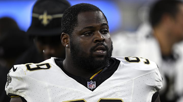 Aug 20, 2023; Inglewood, California, USA; New Orleans Saints defensive tackle Khalen Saunders (99) looks on against the Los Angeles Chargers during the second half at SoFi Stadium. Mandatory Credit: Orlando Ramirez-Imagn Images 