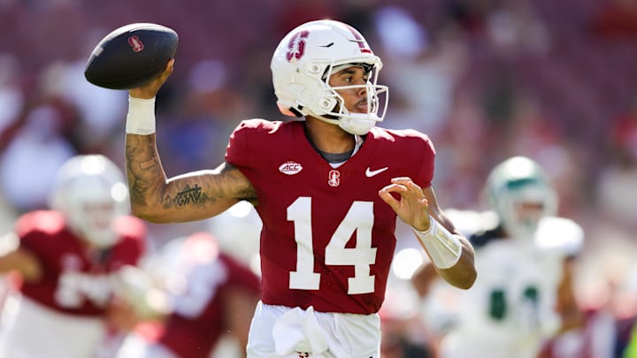 Sep 7, 2024; Stanford, California, USA; Stanford Cardinal quarterback Ashton Daniels (14) throws the ball against the Cal Poly Mustangs during the first quarter at Stanford Stadium. Mandatory Credit: Sergio Estrada-Imagn Images