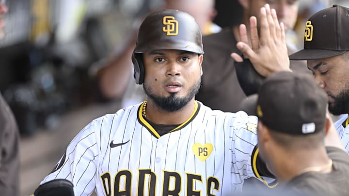 Sep 2, 2024; San Diego, California, USA; San Diego Padres first baseman Luis Arraez (4) is congratulated after scoring during the eighth inning against the Detroit Tigers at Petco Park. Mandatory Credit: Denis Poroy-Imagn Images Sep 2, 2024; San Diego, California, USA; San Diego Padres first baseman Luis Arraez (4) is congratulated after scoring during the eighth inning against the Detroit Tigers at Petco Park. Mandatory Credit: Denis Poroy-Imagn Images