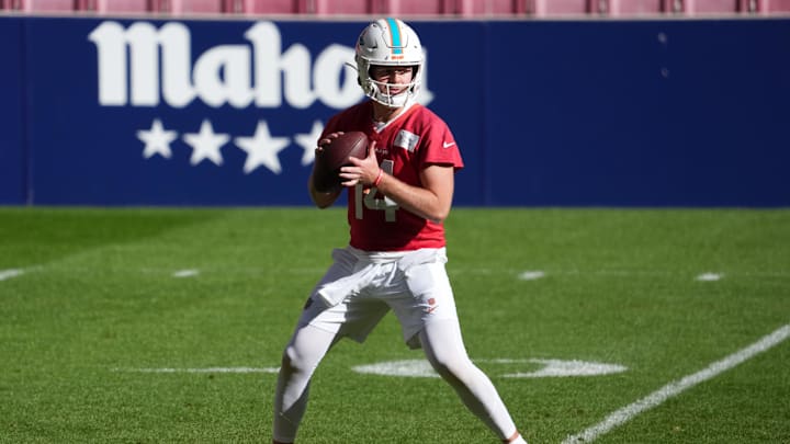 Miami Dolphins quarterback Quinn Ewers (14) throws the ball during practice at Estadio Riyadh Air Metropolitano in Spain.