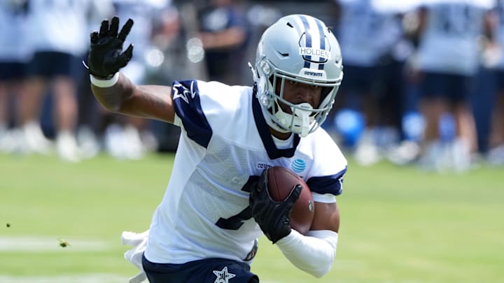 Jul 22, 2025; Oxnard, CA, USA; Dallas Cowboys receiver Traeshon Holden carries the ball during training camp at the River Ridge Fields. Mandatory Credit: Kirby Lee-Imagn Images