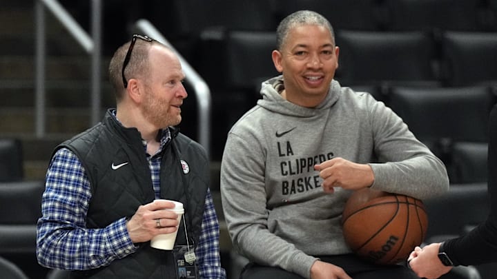 Feb 25, 2024; Los Angeles, California, USA; LA Clippers president of basketball operations Lawrence Frank (left) talks with coach Tyronn Lue before the game against the Sacramento Kings at Crypto.com Arena. Mandatory Credit: Kirby Lee-Imagn Images