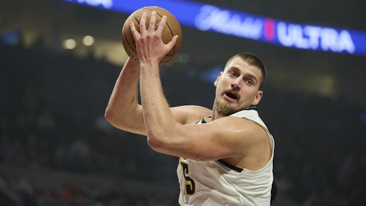 Oct 31, 2025; Portland, Oregon, USA; Denver Nuggets center Nikola Jokic (15) grabs a rebound during the first half against the Portland Trail Blazers at Moda Center. Mandatory Credit: Troy Wayrynen-Imagn Images Oct 31, 2025; Portland, Oregon, USA; Denver Nuggets center Nikola Jokic (15) grabs a rebound during the first half against the Portland Trail Blazers at Moda Center. Mandatory Credit: Troy Wayrynen-Imagn Images
