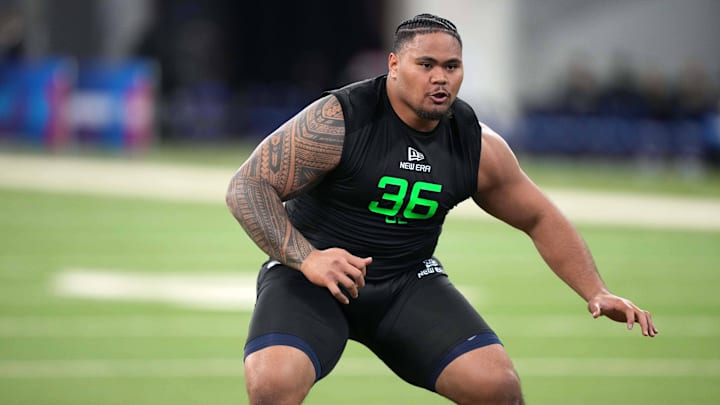 Miami Dolphins second-round pick Jonah Savaiinaea at the 2025 scouting combine.