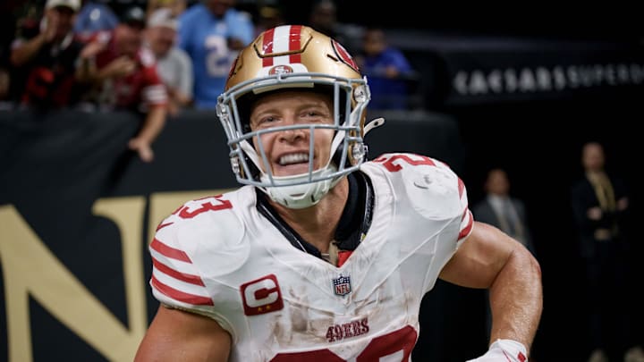 Sep 14, 2025; New Orleans, Louisiana, USA; San Francisco 49ers running back Christian McCaffrey (23) reacts after catching a touchdown against the New Orleans Saints during the second quarter at Caesars Superdome. Sep 14, 2025; New Orleans, Louisiana, USA; San Francisco 49ers running back Christian McCaffrey (23) reacts after catching a touchdown against the New Orleans Saints during the second quarter at Caesars Superdome.