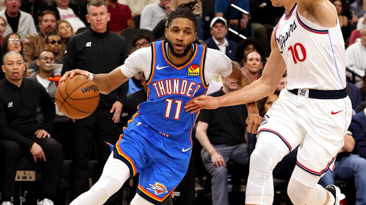 Mar 23, 2025; Inglewood, California, USA; Oklahoma City Thunder guard Isaiah Joe (11) drives against LA Clippers guard Bogdan Bogdanovic (10) during the 4th quarter at Intuit Dome. Mandatory Credit: Jason Parkhurst-Imagn Images Mar 23, 2025; Inglewood, California, USA; Oklahoma City Thunder guard Isaiah Joe (11) drives against LA Clippers guard Bogdan Bogdanovic (10) during the 4th quarter at Intuit Dome. Mandatory Credit: Jason Parkhurst-Imagn Images