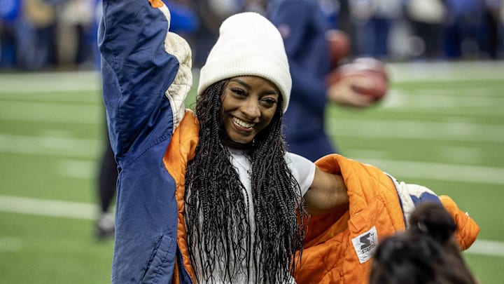 Nov 28, 2024; Detroit, Michigan, USA; USA gymnast Simone Biles poses for some pictures during warm ups Nov 28, 2024; Detroit, Michigan, USA; USA gymnast Simone Biles poses for some pictures during warm ups