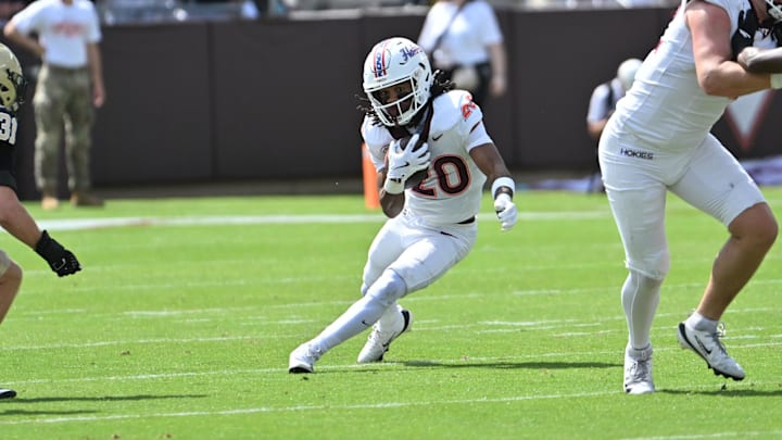 Sep 20, 2025; Blacksburg, Virginia, USA; Virginia Tech Hokies running back P.J. Prioleau (20) runs the ball during the first quarter against the Wofford Terriers at Lane Stadium. Mandatory Credit: Brian Bishop-Imagn Images Sep 20, 2025; Blacksburg, Virginia, USA; Virginia Tech Hokies running back P.J. Prioleau (20) runs the ball during the first quarter against the Wofford Terriers at Lane Stadium. Mandatory Credit: Brian Bishop-Imagn Images