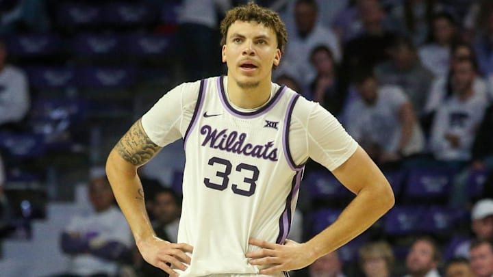 Jan 11, 2025; Manhattan, Kansas, USA; Kansas State Wildcats forward Coleman Hawkins (33) looks at the scoreboard during a break in the action against the Houston Cougars at Bramlage Coliseum. Mandatory Credit: Scott Sewell-Imagn Images Jan 11, 2025; Manhattan, Kansas, USA; Kansas State Wildcats forward Coleman Hawkins (33) looks at the scoreboard during a break in the action against the Houston Cougars at Bramlage Coliseum. Mandatory Credit: Scott Sewell-Imagn Images