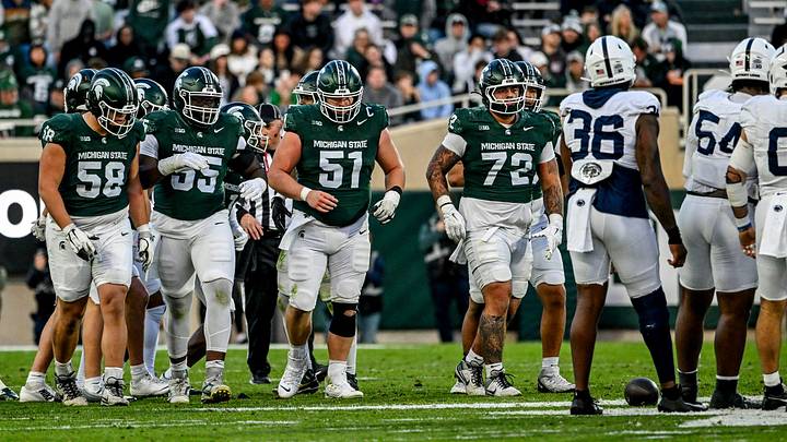Michigan State's offensive line approaches the scrimmage against Penn State during the second quarter on Saturday, Nov. 15, 2025, at Spartan Stadium in East Lansing. Michigan State's offensive line approaches the scrimmage against Penn State during the second quarter on Saturday, Nov. 15, 2025, at Spartan Stadium in East Lansing.