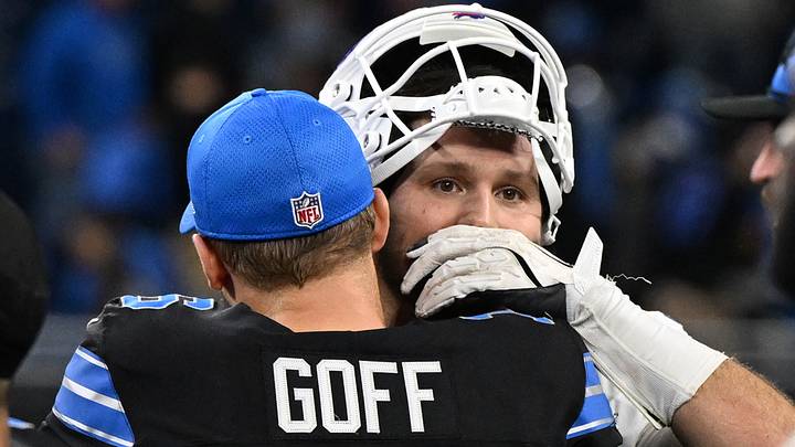 Dec 15, 2024; Detroit, Michigan, USA; Buffalo Bills quarterback Josh Allen (17) exchanges words with Detroit Lions quarterback Jared Goff (16) following their win over the Lions at Ford Field. Mandatory Credit: Lon Horwedel-Imagn Images