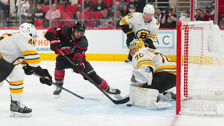 Apr 7, 2026; Raleigh, North Carolina, USA; Boston Bruins goaltender Joonas Korpisalo (70) stops the scoring attempt by Carolina Hurricanes defenseman Shayne Gostisbehere (4) during the third period at Lenovo Center. Mandatory Credit: James Guillory-Imagn Images Apr 7, 2026; Raleigh, North Carolina, USA; Boston Bruins goaltender Joonas Korpisalo (70) stops the scoring attempt by Carolina Hurricanes defenseman Shayne Gostisbehere (4) during the third period at Lenovo Center. Mandatory Credit: James Guillory-Imagn Images