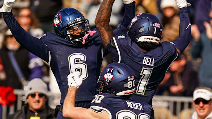 Nov 1, 2025; East Hartford, Connecticut, USA; UConn Huskies wide receiver Skyler Bell (1) celebrate with teammates after his touchdown against the UAB Blazers in the second half at Pratt & Whitney Stadium at Rentschler Field. Mandatory Credit: David Butler II-Imagn Images Nov 1, 2025; East Hartford, Connecticut, USA; UConn Huskies wide receiver Skyler Bell (1) celebrate with teammates after his touchdown against the UAB Blazers in the second half at Pratt & Whitney Stadium at Rentschler Field. Mandatory Credit: David Butler II-Imagn Images