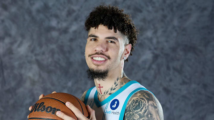 Sep 29, 2025; Charlotte, NC, USA; Charlotte Hornets guard LaMelo Ball (1) poses for a photo during media day at Queens University. Mandatory Credit: Brian Westerholt-Imagn Images