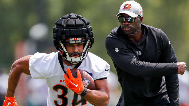 Jul 26, 2023; Cincinnati, OH, USA; Cincinnati Bengals halfback Jacob Saylors (34) runs drills during training camp at Kettering Health Practice Fields. Jul 26, 2023; Cincinnati, OH, USA; Cincinnati Bengals halfback Jacob Saylors (34) runs drills during training camp at Kettering Health Practice Fields.