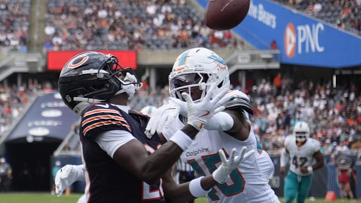 Chicago Bears wide receiver Jahdae Walker (20) catches a touchdown pass as Miami Dolphins linebacker Jaelan Phillips (15) defends him during the second half at Soldier Field.